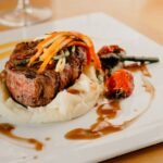Beef fillet with chimichurri puree and grilled mushrooms